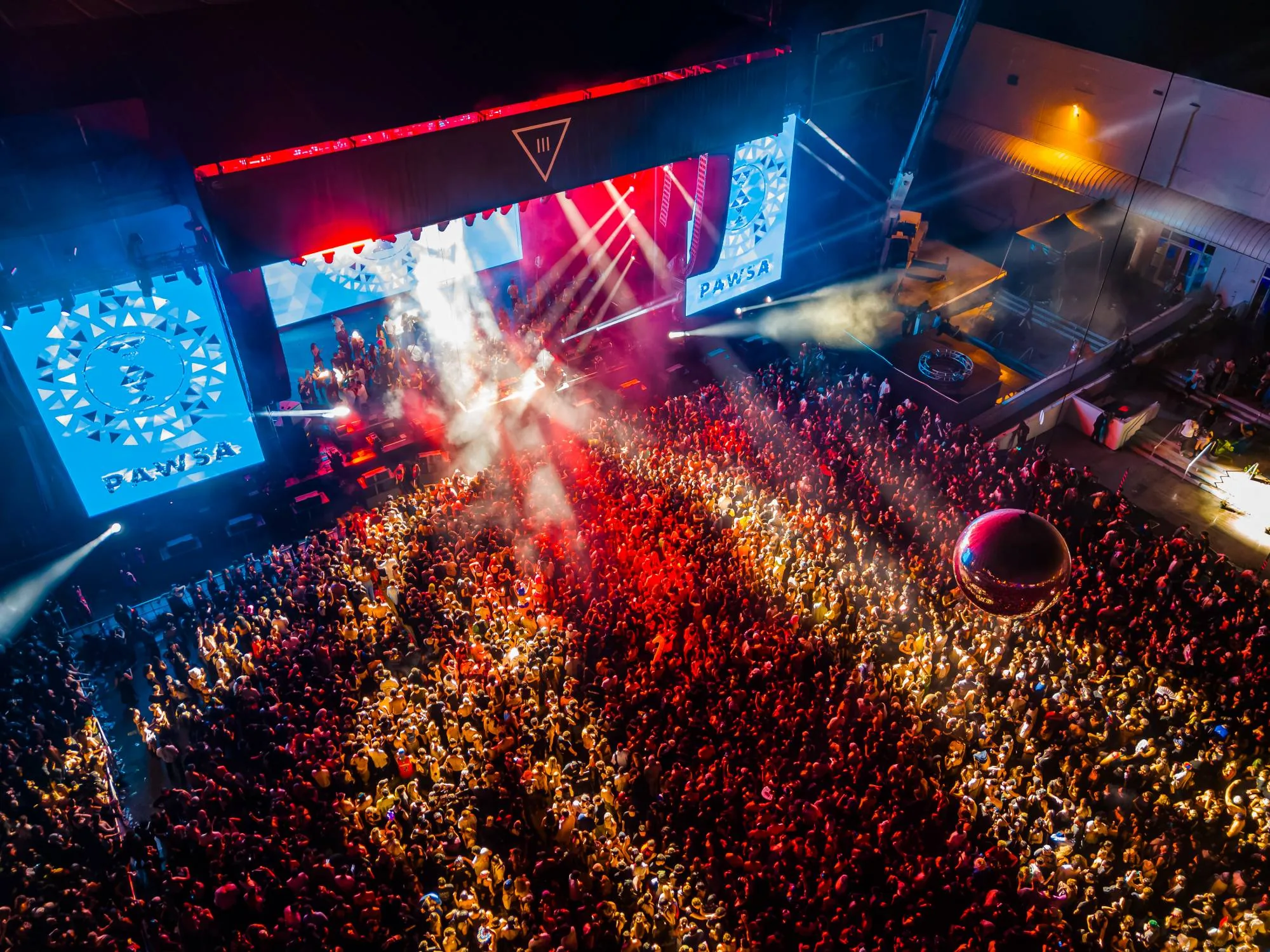 Aerial view of the Mind Melt stage crowd during Pawsa at III Points 2026